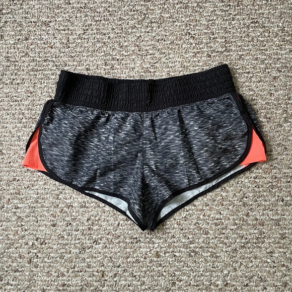 Women’s black and orange athletic shorts - Picture 1 of 3